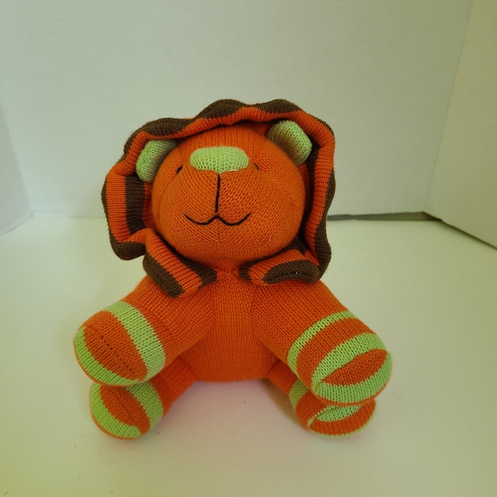 World Market Orange Lion Plush minor flaw weakened stitching see images